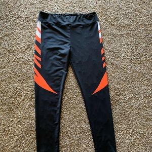 Brand New orange, black and white leggings